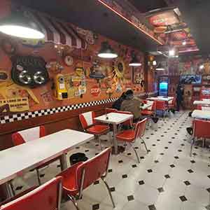 USA 1950 Classic Dinner In Boston-Classic red and white V shape 1950s diner chairs and table set, 4 seat V shape red 1950s diner chairs and table set gallery